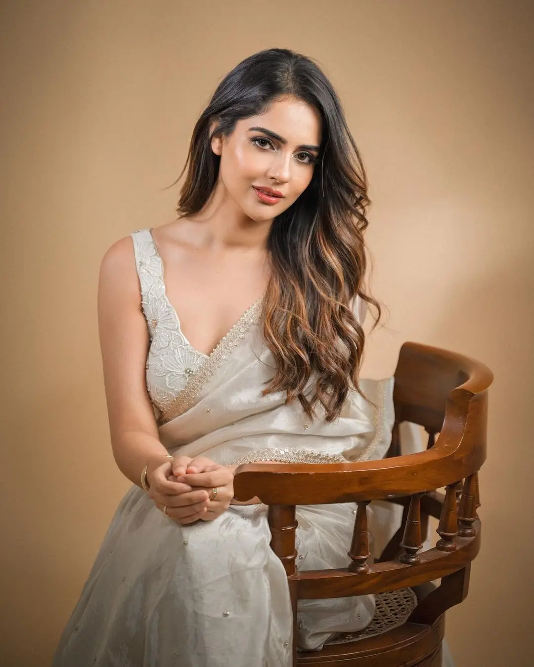 Malvi Malhotra Stills in White Saree Sleeveless Blouse